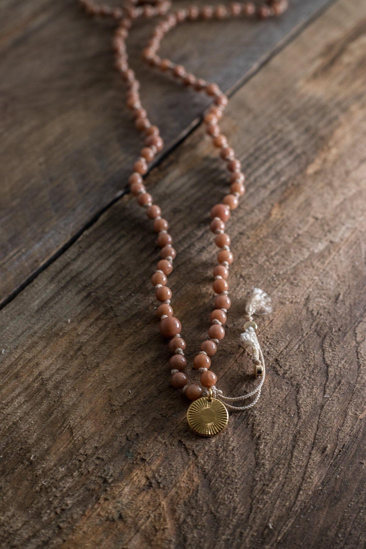 Women wearing the Love & Abundance Mala Rose by Rose Boreal - Mala Rose Over / Femme qui porte le Mala Amour & Abondance - Mala Rose Over